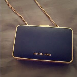 Michael Kors black and gold clutch